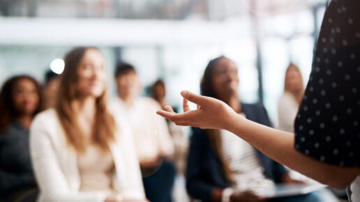 Cropped shot of a businesswoman delivering a speech during a conference